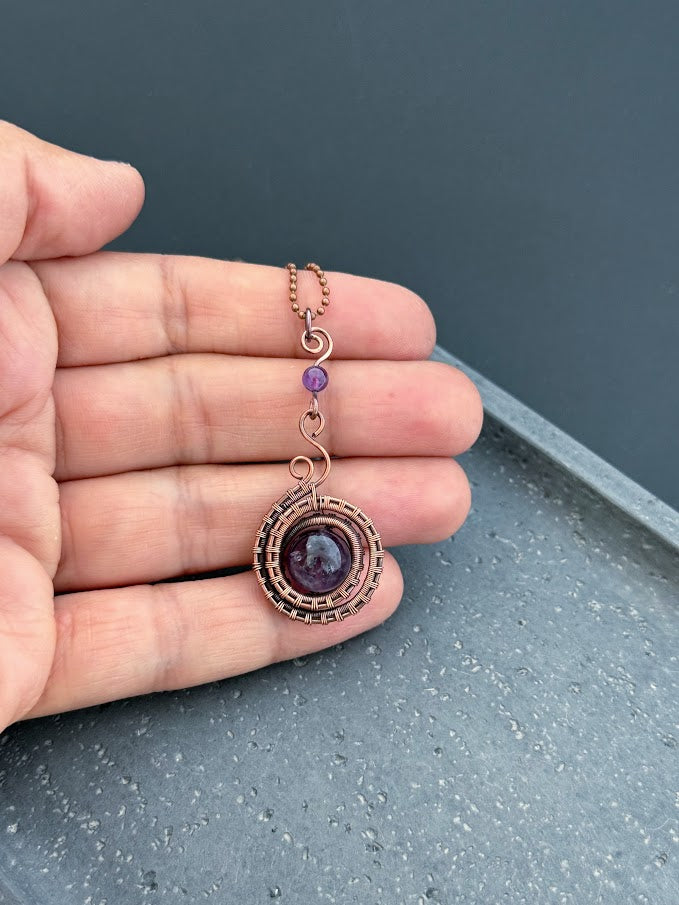Amethyst Pendant in Intricate Copper Weave